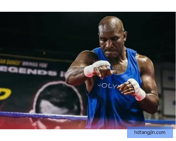 力量与意志的交锋霍利菲尔德对决福尔曼的世纪拳台巅峰之战